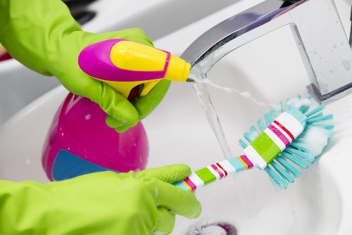 Professional cleaners working in a Bermondsey office environment
